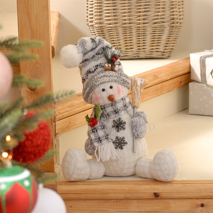 Grey Sitting Snowman with Snow Broom