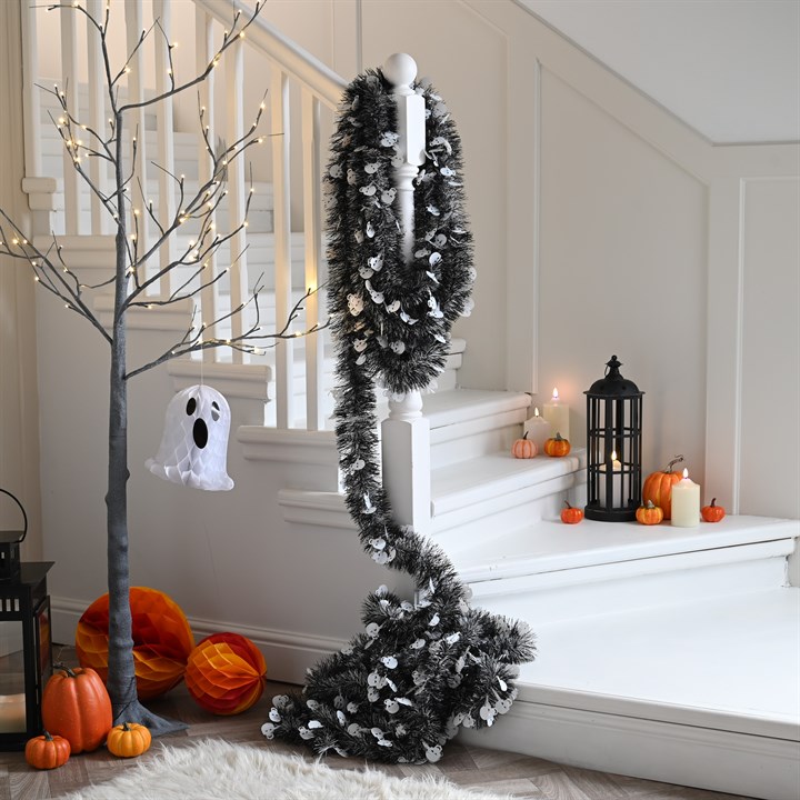 Extra Long 10m Black & White Halloween Skull Tinsel